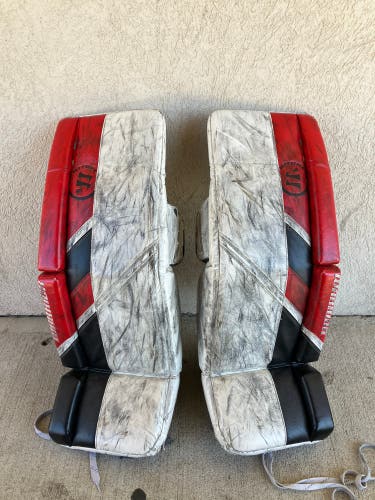 Red 31" Intermediate Warrior Ritual G5 Goalie Leg Pads (Used)