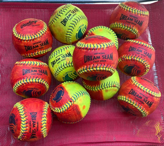 One Dozen - Rawlings Dream Seam (Used) 11” 1/2 colored red leather softballs for pitcher training