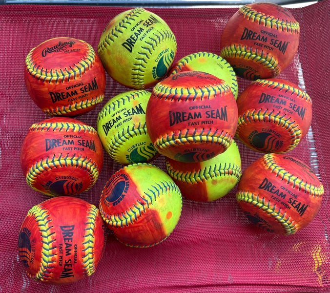 One Dozen - Rawlings Dream Seam (Used) 11” 1/2 colored red leather softballs for pitcher training
