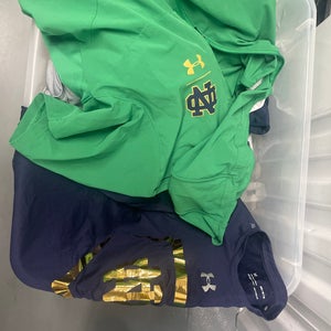 Box of Notre Dame gear short sleeve long sleeve polos hoodies UA in great condition