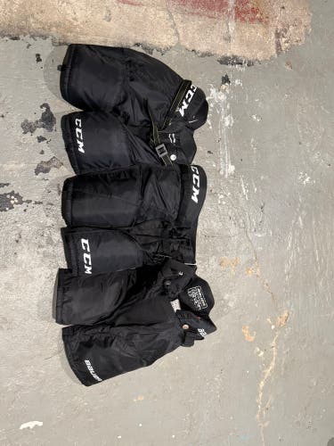 3 pack - Youth Medium/large CCM Hockey Pants (Used)