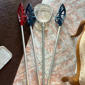 Bunch of mini fiddle lacrosse sticks