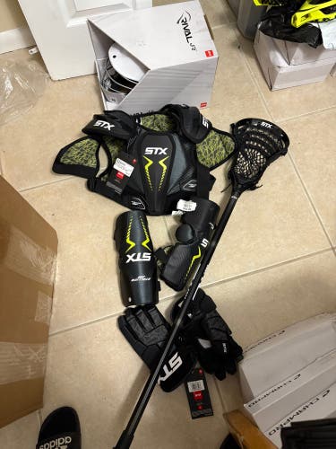 Youth medium STX Starter Kit (New)- lacrosse equipment . Full set up