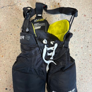 Black Youth Medium Bauer Supreme Ultrasonic Hockey Pants (Used)