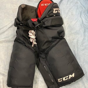 Black Junior Large CCM QLT 290 Hockey Pants (Used)