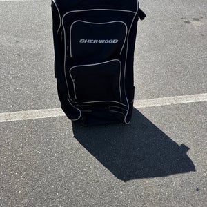 Sher-Wood Wheeled Hockey Bag (Used) | 33”x19”x11”