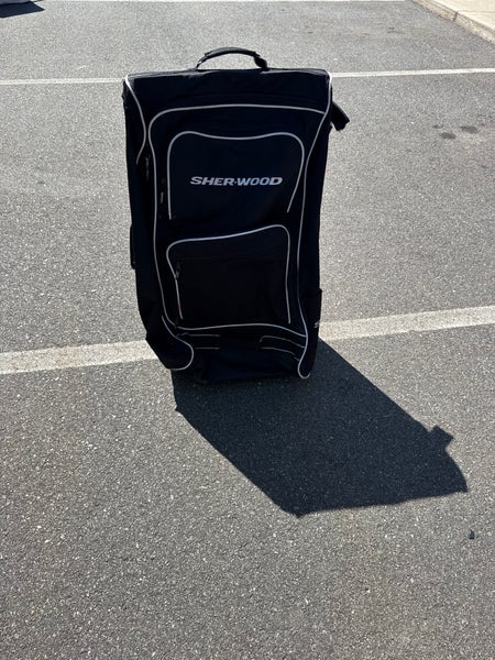Sher-Wood Wheeled Hockey Bag (Used) | 33”x19”x11”