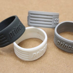 PRINCE (TRADITIONAL STYLE) RUBBER GRIP BAND FOR TENNIS RACQUETS (USED) QTY: 4