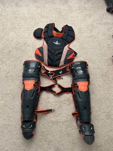 Black and Orange MVP-Pro Series catching gear (Used)