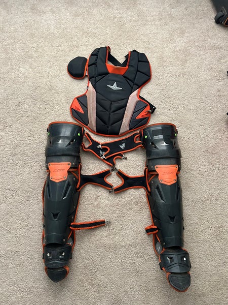 Black and Orange MVP-Pro Series catching gear (Used)