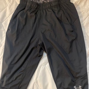 Black Under Armour Medium 3/4 length soccer shorts Used