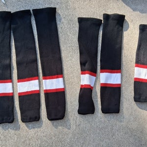 4 pairs of hockey socks with a garter belt (Used)