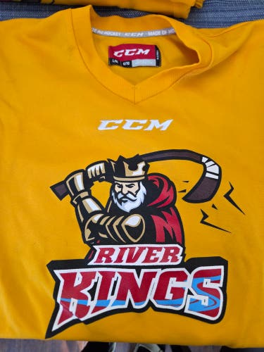 Set of Gold jerseys with logo