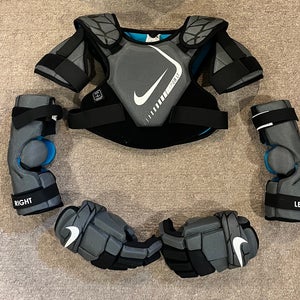 Medium Youth Nike Vapor LT Shoulder pads, elbow pads, and gloves (Used)
