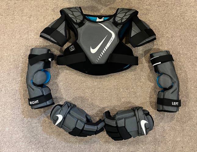 Medium Youth Nike Vapor LT Shoulder pads, elbow pads, and gloves (Used)