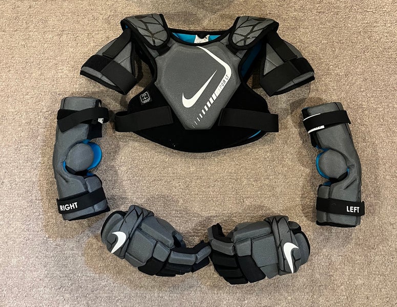 Medium Youth Nike Vapor LT Shoulder pads, elbow pads, and gloves (Used)