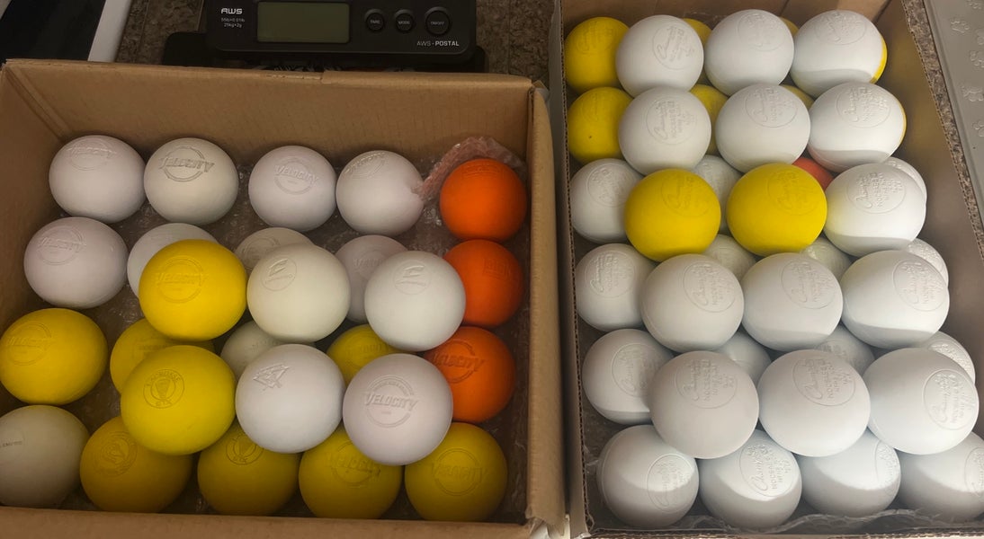 65 Assorted lacrosse balls lightly used and new
