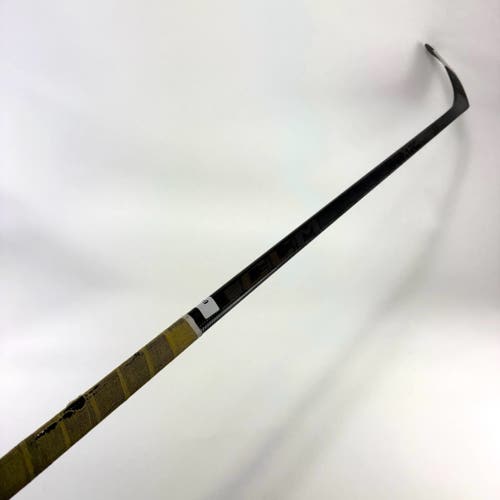 Used Right CCM Tacks XF Ghost | 85 Flex Laine Pro Curve Grip | E409
