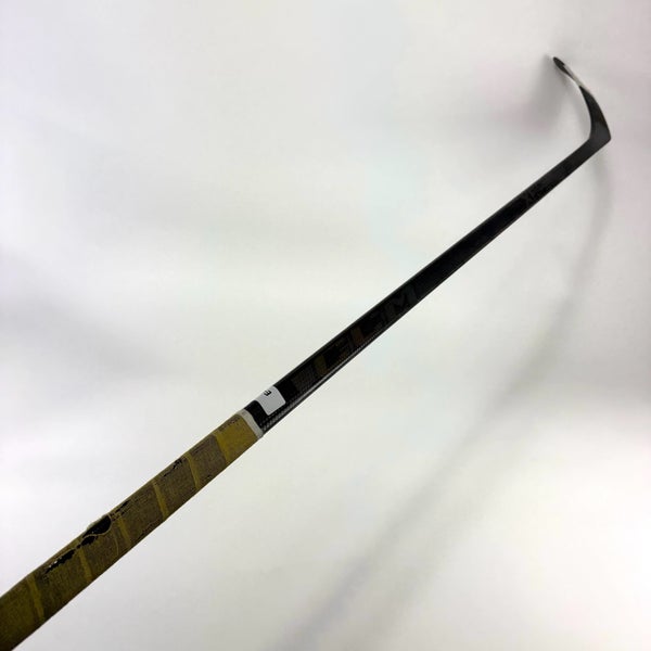 Used Right CCM Tacks XF Ghost | 85 Flex Laine Pro Curve Grip | E409