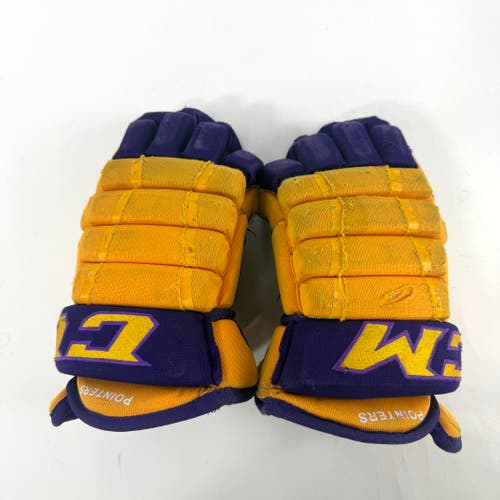 Used Yellow and Purple CCM 4 Roll Pro Gloves | 14" | E452