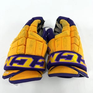 Used Yellow and Purple CCM 4 Roll Pro Gloves | 14" | E559