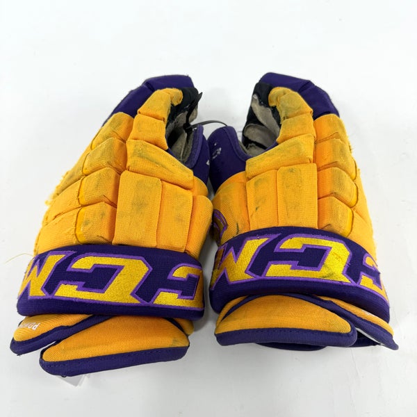 Used Yellow and Purple CCM 4 Roll Pro Gloves | 14" | E559