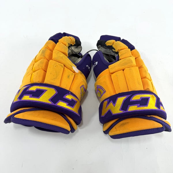 Used Yellow and Purple CCM 4 Roll Pro Gloves | 14" | E465