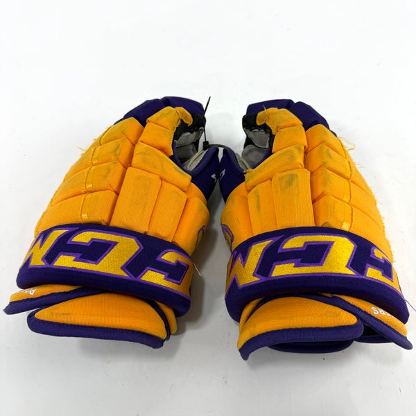Used Yellow and Purple CCM 4 Roll Pro Gloves | 14" | E457