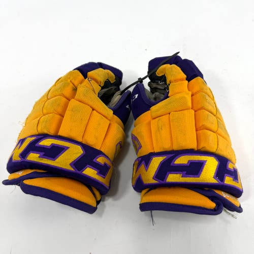 Used Yellow and Purple CCM 4 Roll Pro Gloves | 13" | E460