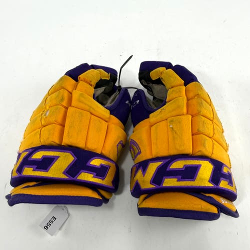 Used Yellow and Purple CCM 4 Roll Pro Gloves | 13" | E556