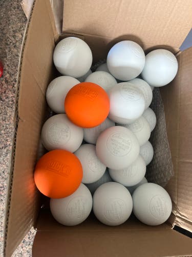 30 Lacrosse Ball Pack (28 New out of box white Champion Sports, 2 orange Dicks)