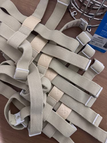 New stock Bauer backplate harness