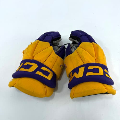 Used Yellow and Purple CCM Jetspeed Gloves | 14" | E551