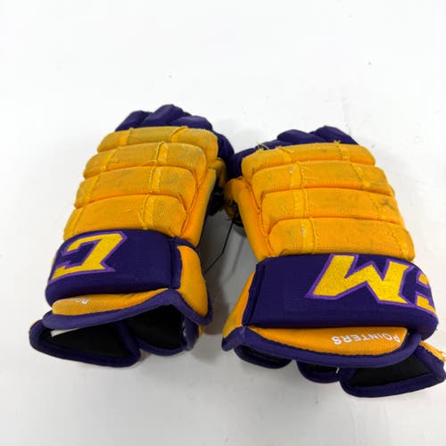 Used Yellow and Purple CCM 4 Roll Pro Gloves | 14" | E550