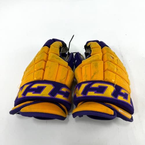 Used Yellow and Purple CCM 4 Roll Pro Gloves | 14" | E456