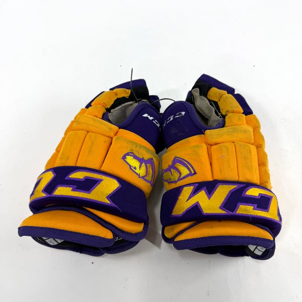 Used Yellow and Purple CCM 4 Roll Pro Gloves | 13" | E459