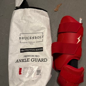 Red ankle guard -left