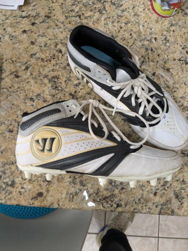 Warrior Cleats size 10
