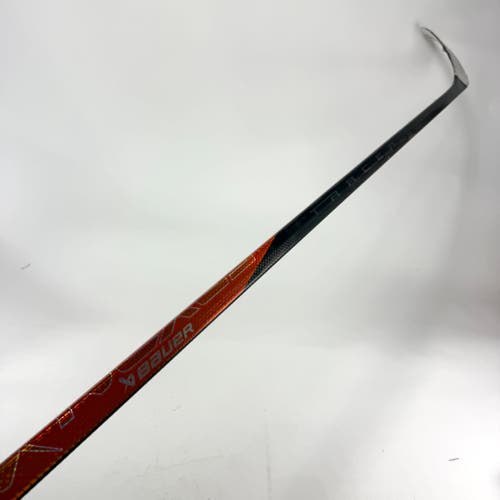 Repaired Right Handed Orange Bauer Tracer - 95 Flex P28 Curve Grip - #E114