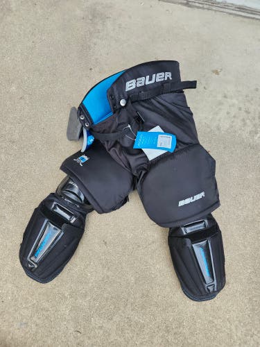 Youth Large Bauer prodigy Hockey Pants and Shin gaurds (New)