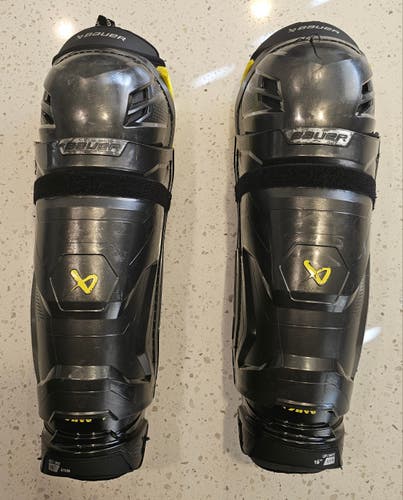 Used Bauer Supreme Mach Shin Pads Sr. (Left shin guards is cracked)