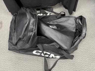 Used CCM Jr Hockey Wheeled Black 11855-S000190353