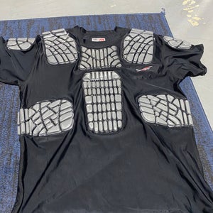 Protective compression shirt for football hockey lacrosse