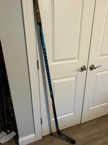 NHL used Senior Warrior Covert QRL Left Hand Hockey Stick Mid Pattern Pro Stock