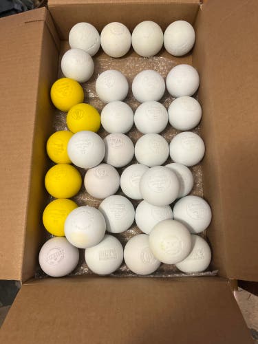 Lot of 33 lightly used and new lacrosse balls