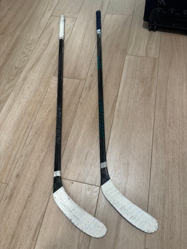 2 Junior Bauer Twitch Right Handed Hockey Sticks (Used)