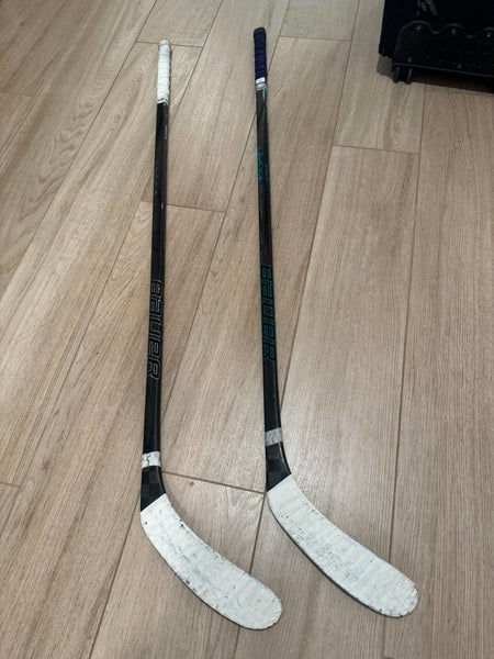 2 Junior Bauer Twitch Right Handed Hockey Sticks (Used)