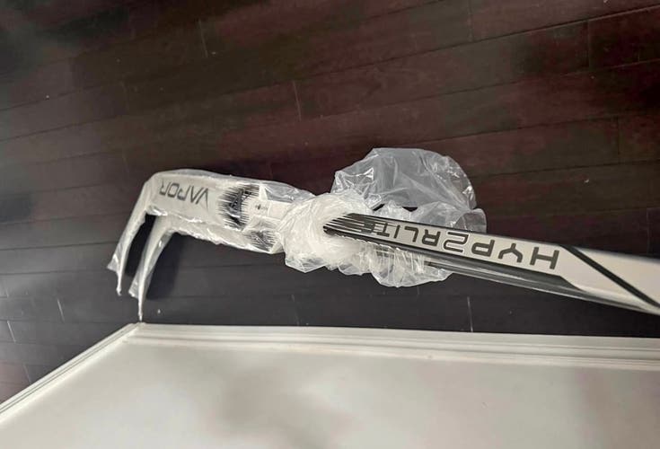 Brand new pro stock Bauer hyperlite 2 full right goalie stick