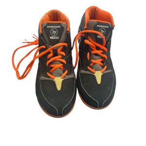 Used Warrior LAX Cleats Boys Black And Orange Junior 04.5 11863-S000024271