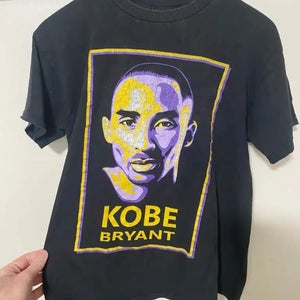 Vintage Men’s Medium Black T-shirt featuring a Colorful Yellow and Purple Graphic of Kobe Bryant.